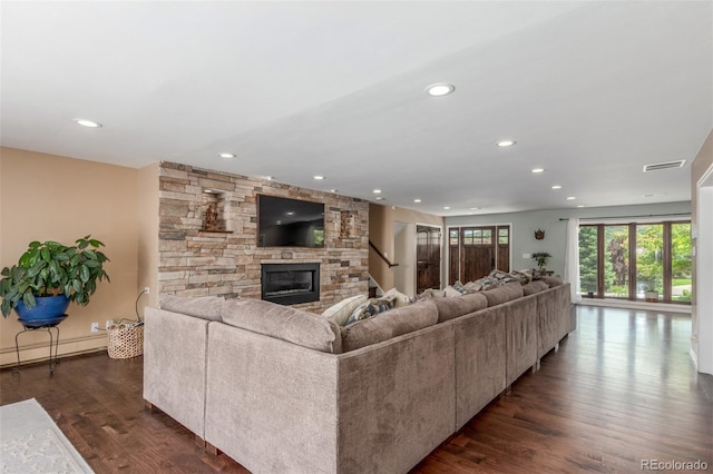 5727 Colorow Dr, Morrison, CO 80465 - living area with a stone fireplace, recessed lighting, and dark wood finished floors