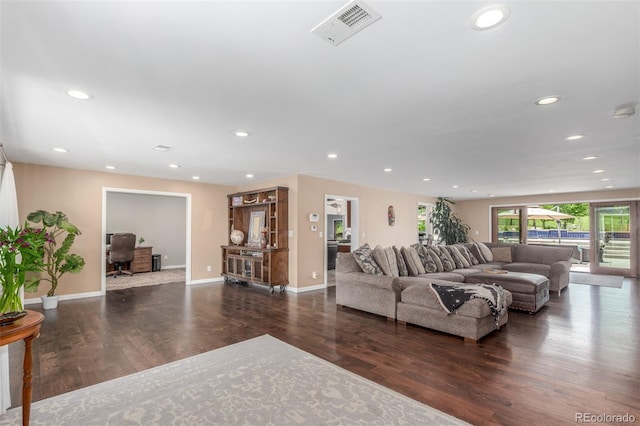 5727 Colorow Dr, Morrison, CO 80465 - living area featuring wood finished floors, baseboards, and recessed lighting