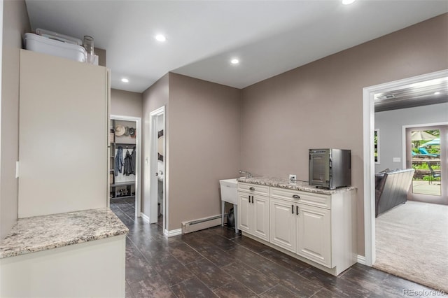 5727 Colorow Dr, Morrison, CO 80465 - bar featuring a baseboard heating unit, recessed lighting, and baseboards