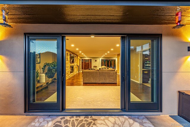 5727 Colorow Dr, Morrison, CO 80465 - view of exterior entry featuring stucco siding