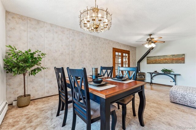dining room featuring carpet floors, a textured ceiling, ceiling fan with notable chandelier, wallpapered walls, and a baseboard heating unit