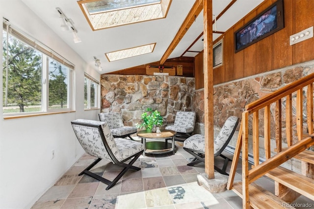 interior space featuring a skylight and track lighting