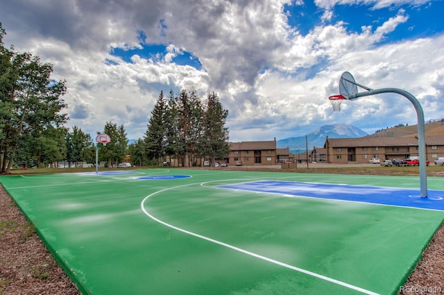 1153 Straight Creek Dr Unit F102, Dillon, CO 80435 - view of basketball court featuring a mountain view and community basketball court
