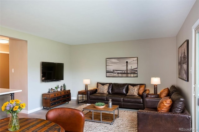 1153 Straight Creek Dr Unit F102, Dillon, CO 80435 - living area featuring baseboards and wood finished floors