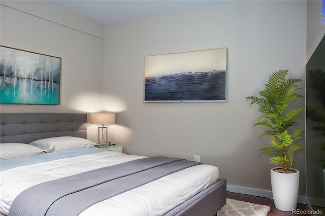 1153 Straight Creek Dr Unit F102, Dillon, CO 80435 - bedroom with wood finished floors and baseboards