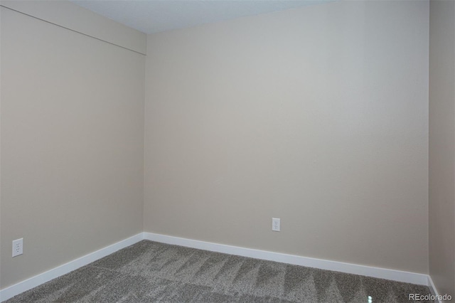 1153 Straight Creek Dr Unit F102, Dillon, CO 80435 - spare room featuring dark colored carpet and baseboards