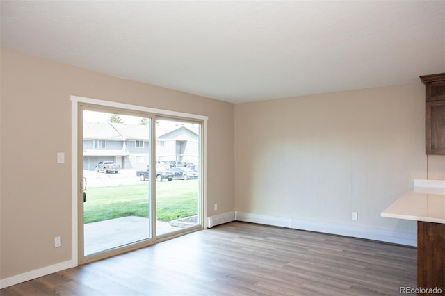 1153 Straight Creek Dr Unit F102, Dillon, CO 80435 - unfurnished dining area with wood finished floors and baseboards