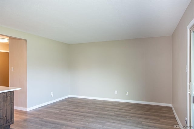 1153 Straight Creek Dr Unit F102, Dillon, CO 80435 - unfurnished room featuring wood finished floors and baseboards