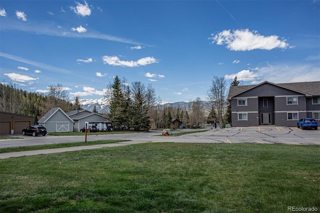 1153 Straight Creek Dr Unit F102, Dillon, CO 80435 - view of green lawn featuring a mountain view