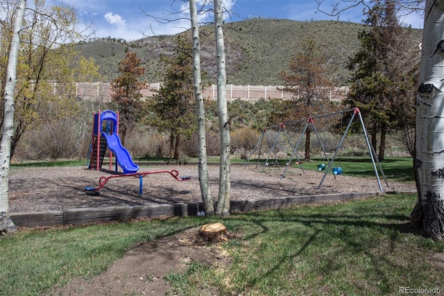 1153 Straight Creek Dr Unit F102, Dillon, CO 80435 - communal playground with a mountain view