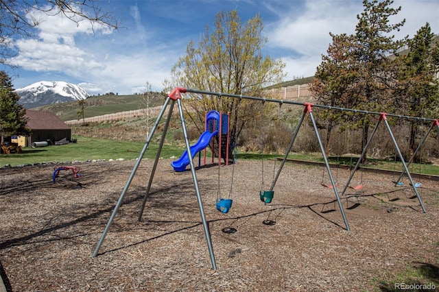 1153 Straight Creek Dr Unit F102, Dillon, CO 80435 - view of playground with a lawn