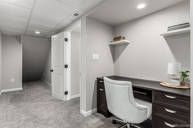 office featuring light colored carpet, recessed lighting, baseboards, and built in desk