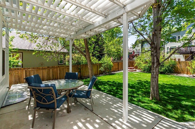 view of patio with a pergola and outdoor dining space