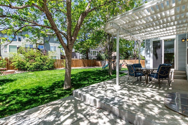 view of patio featuring a pergola and outdoor dining area