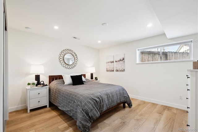 bedroom with light hardwood / wood-style floors