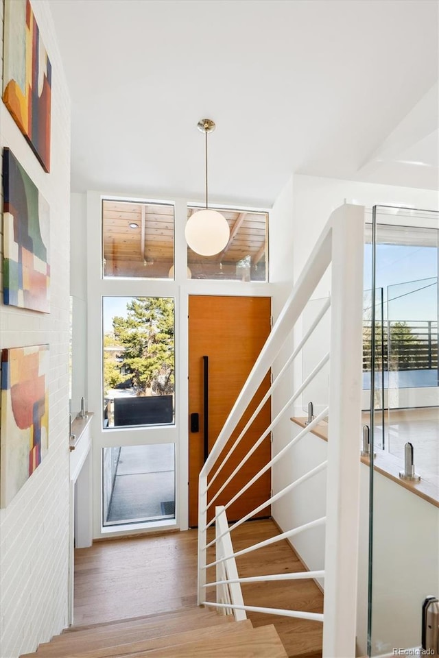 staircase featuring hardwood / wood-style floors