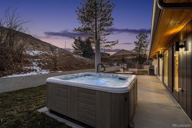 exterior space featuring a hot tub