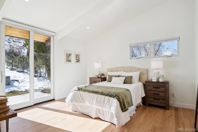 bedroom featuring access to outside, a wall of windows, lofted ceiling with beams, and light wood-type flooring