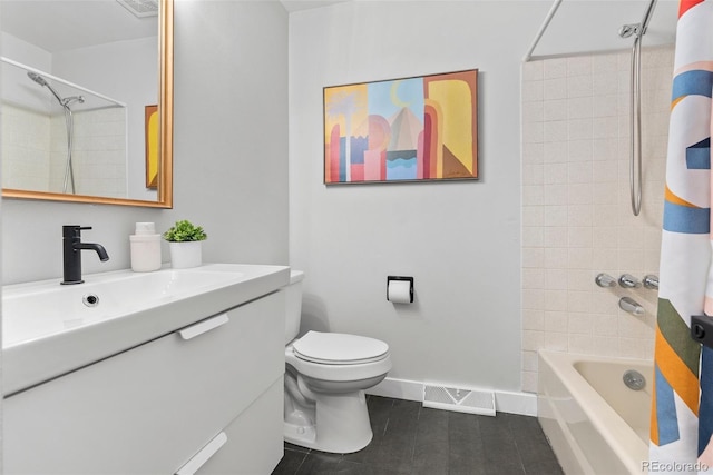 full bathroom featuring tile patterned floors, toilet, shower / bath combination with curtain, and vanity