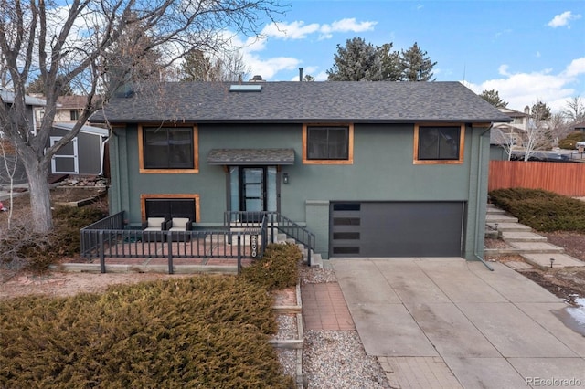 view of front of home with a garage