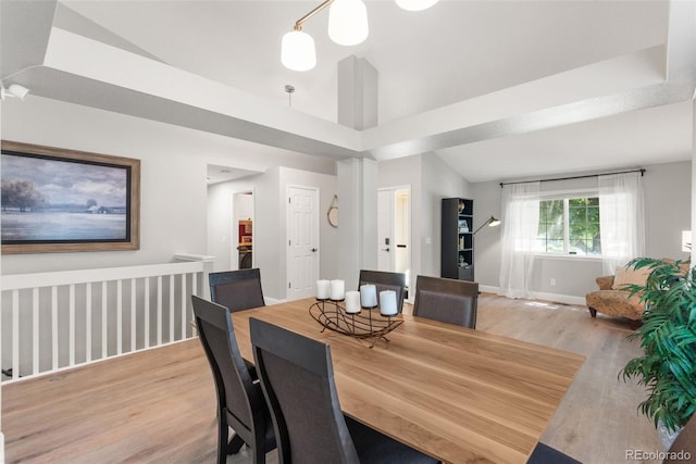 5332 S Lisbon Way, Centennial, CO 80015 - dining space with wood finished floors, lofted ceiling, and baseboards