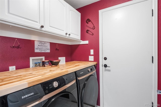 5332 S Lisbon Way, Centennial, CO 80015 - laundry room featuring independent washer and dryer, cabinet space, and a textured wall