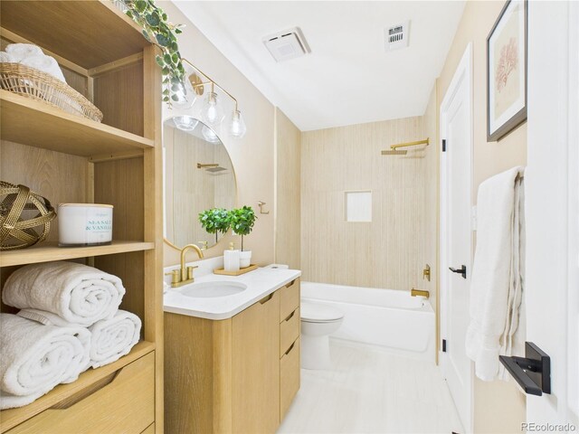 7205 S Gaylord St Unit G, Centennial, CO 80122 - full bathroom featuring vanity, toilet, and shower / tub combination