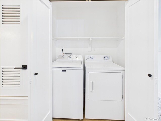 7205 S Gaylord St Unit G, Centennial, CO 80122 - laundry area with washing machine and dryer