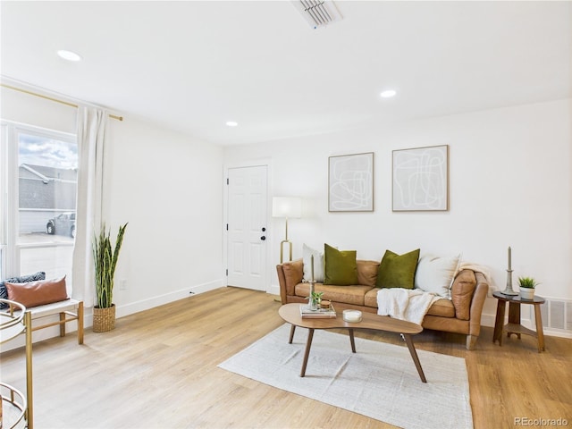 7205 S Gaylord St Unit G, Centennial, CO 80122 - living area featuring light wood-type flooring, baseboards, and recessed lighting