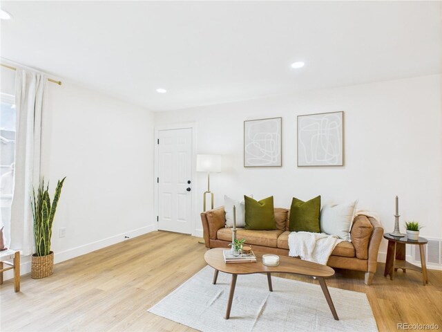 7205 S Gaylord St Unit G, Centennial, CO 80122 - living room with light wood-style flooring, baseboards, and recessed lighting