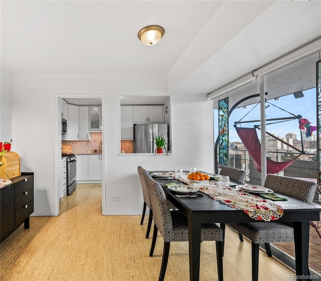 dining room with light hardwood / wood-style floors