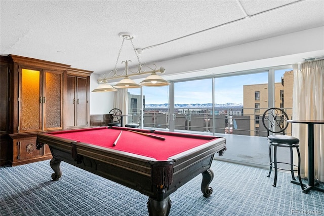 rec room featuring pool table, light carpet, and plenty of natural light