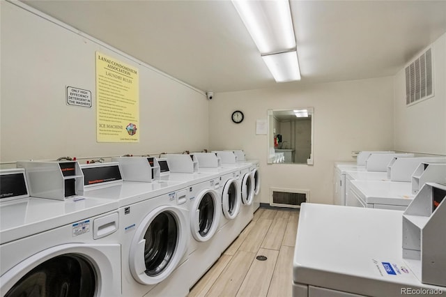 laundry room featuring separate washer and dryer