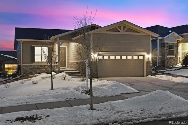 view of front of property with a garage