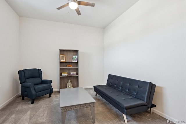 sitting room with carpet floors and ceiling fan