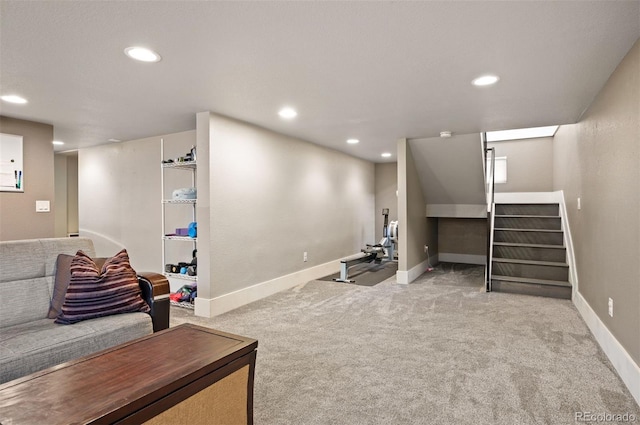 finished basement with stairway, recessed lighting, baseboards, and carpet