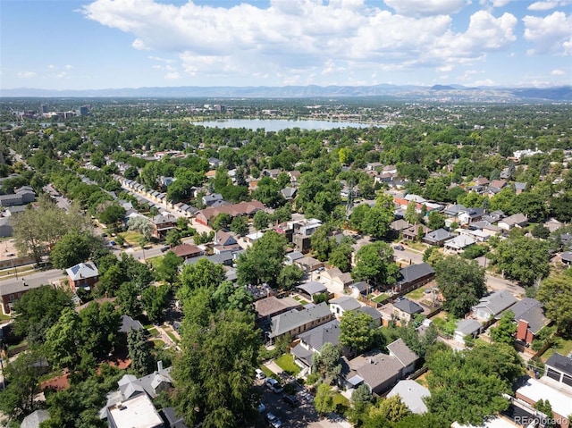 birds eye view of property featuring a water view and a residential view