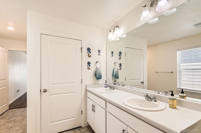 2417 Mountain Sky Dr, Fort Lupton, CO 80621 - bathroom featuring double vanity