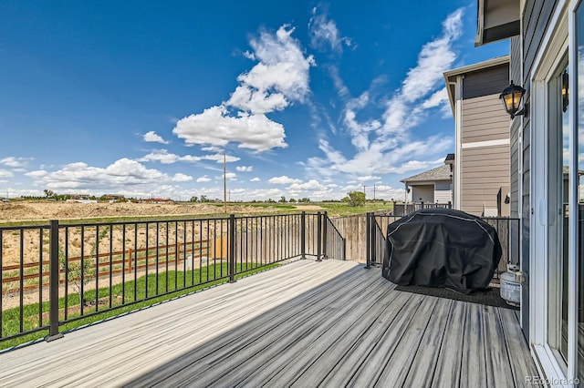 2417 Mountain Sky Dr, Fort Lupton, CO 80621 - wooden terrace with grilling area