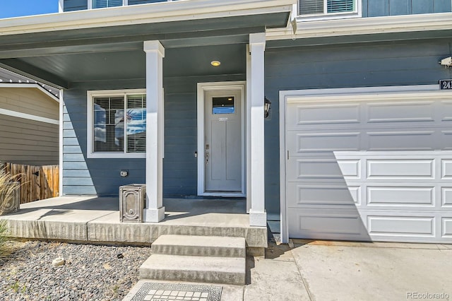 2417 Mountain Sky Dr, Fort Lupton, CO 80621 - doorway to property with a garage and a porch