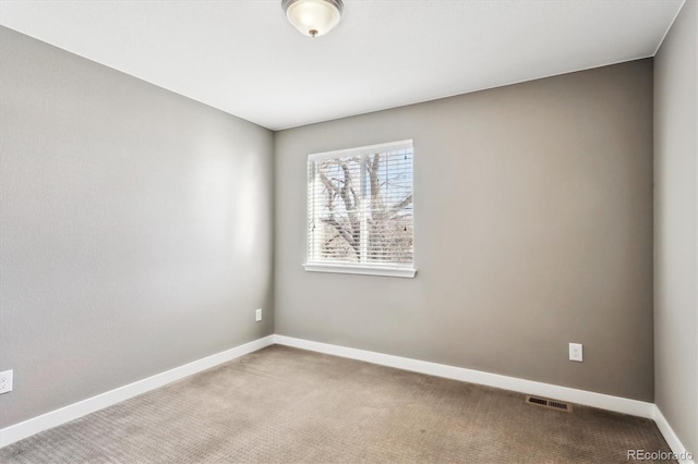 view of carpeted spare room