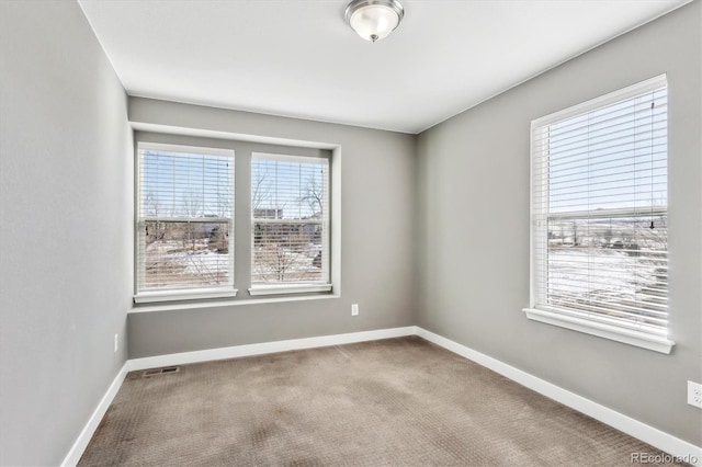 view of carpeted spare room