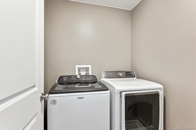 laundry room featuring independent washer and dryer