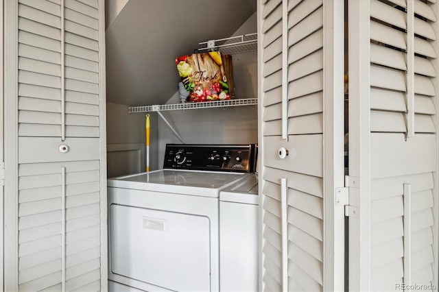 laundry room featuring independent washer and dryer