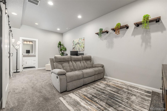 carpeted living room featuring recessed lighting, visible vents, and baseboards