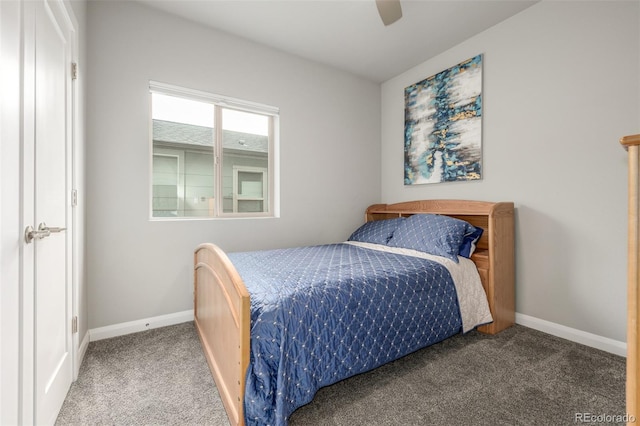 bedroom featuring ceiling fan, carpet, and baseboards