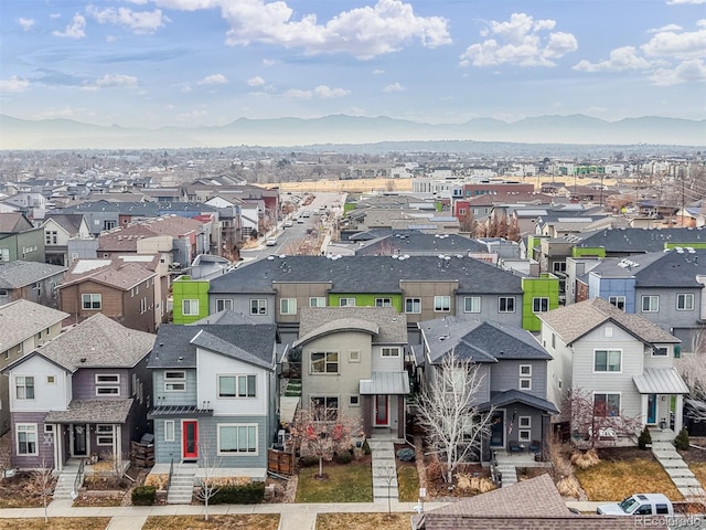 birds eye view of property with a residential view and a mountain view