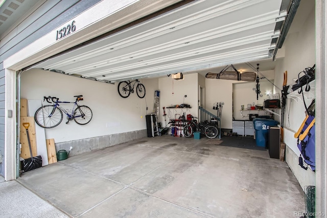 garage featuring a garage door opener