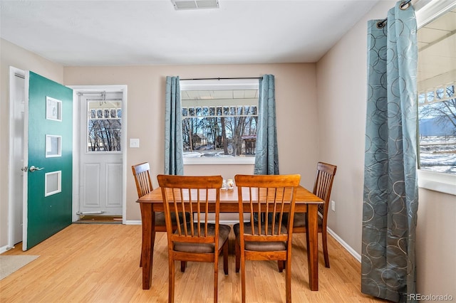 15071 County Road 306, Buena Vista, CO 81211 - dining room featuring light wood finished floors, plenty of natural light, and baseboards