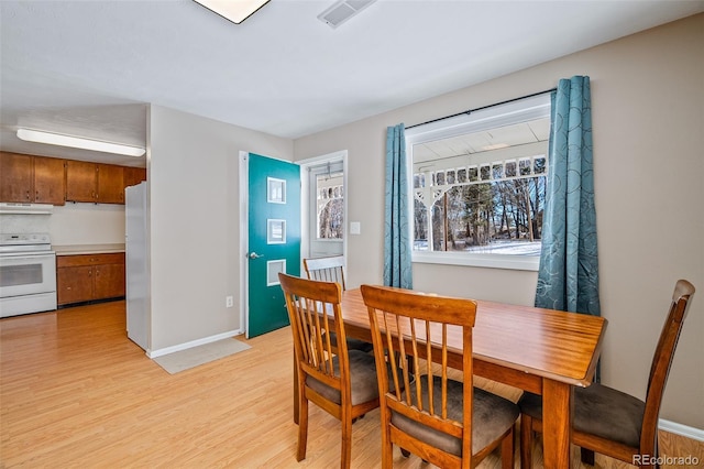 15071 County Road 306, Buena Vista, CO 81211 - dining space featuring light wood finished floors and baseboards